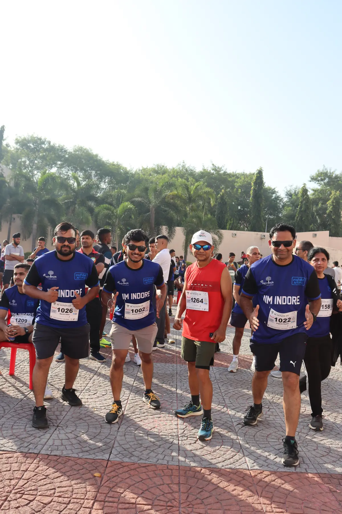 Runners loosening up together before the start